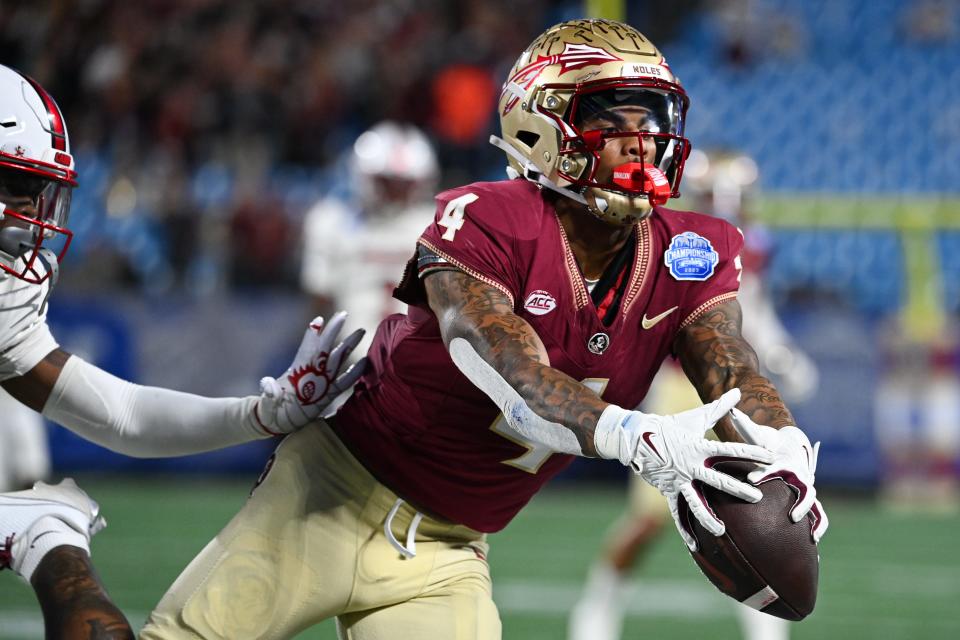 Florida State wide receiver Keon Coleman makes a catch during Saturday's ACC title game against Louisville.
