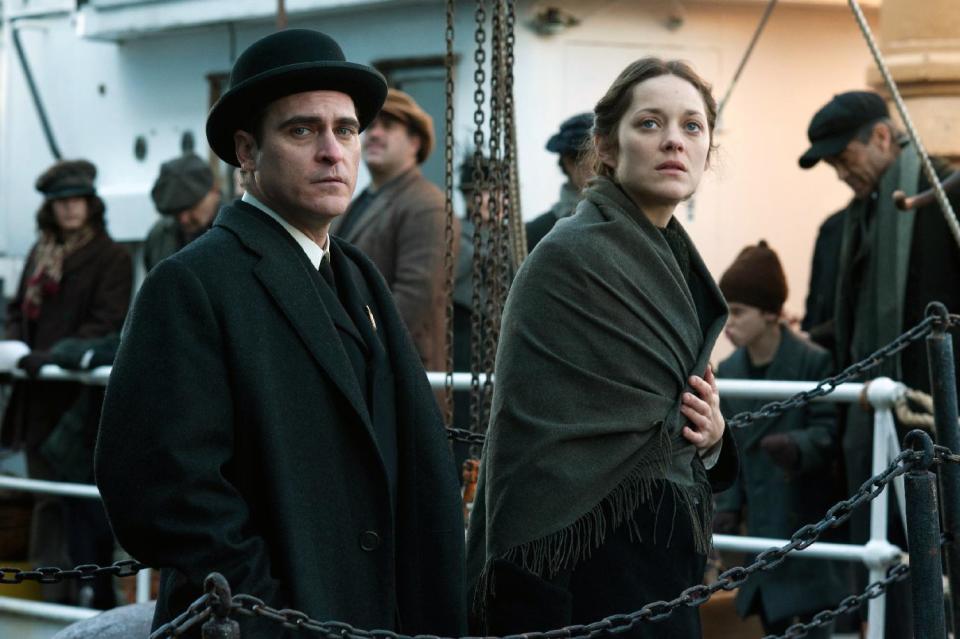 This image released by The Weinstein Company shows Joaquin Phoenix, left, and Marion Cotillard in a scene from "The Immigrant." (AP Photo/The Weinstein Company, Anne Joyce)