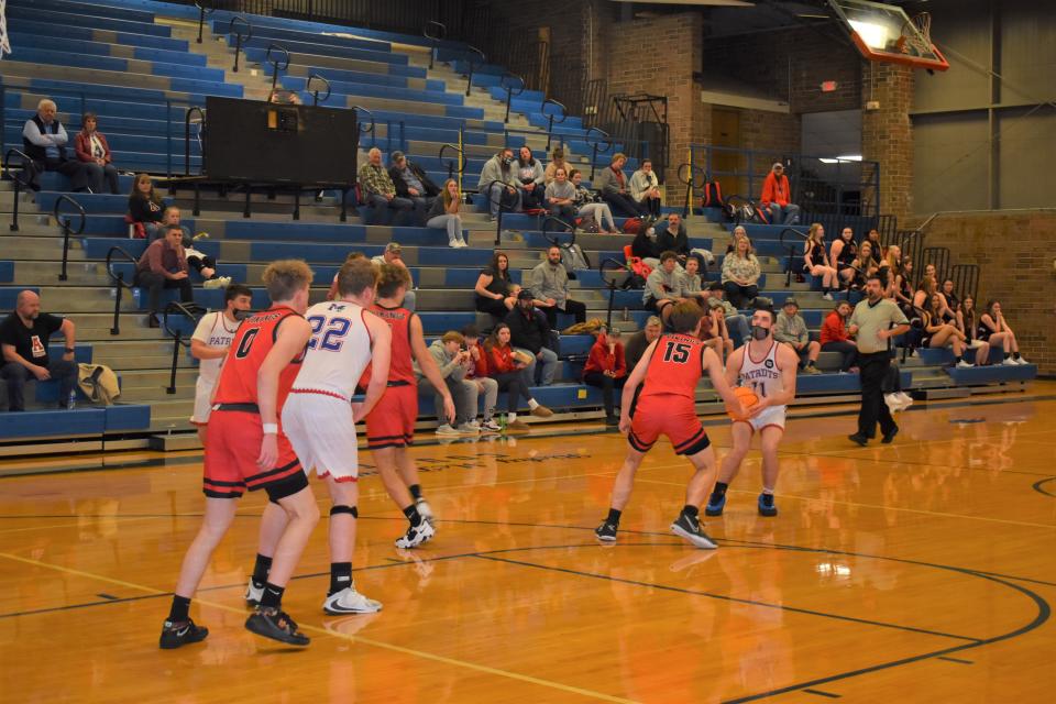 Madison junior guard Caden Hilemon picks up his dribble in the third quarter of the Patriots' 78-49 loss to Avery Feb. 2.