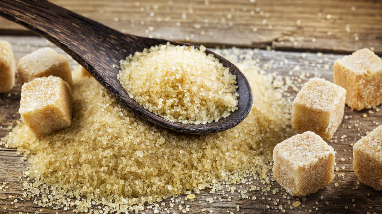 brown sugar in a spoon and cubes