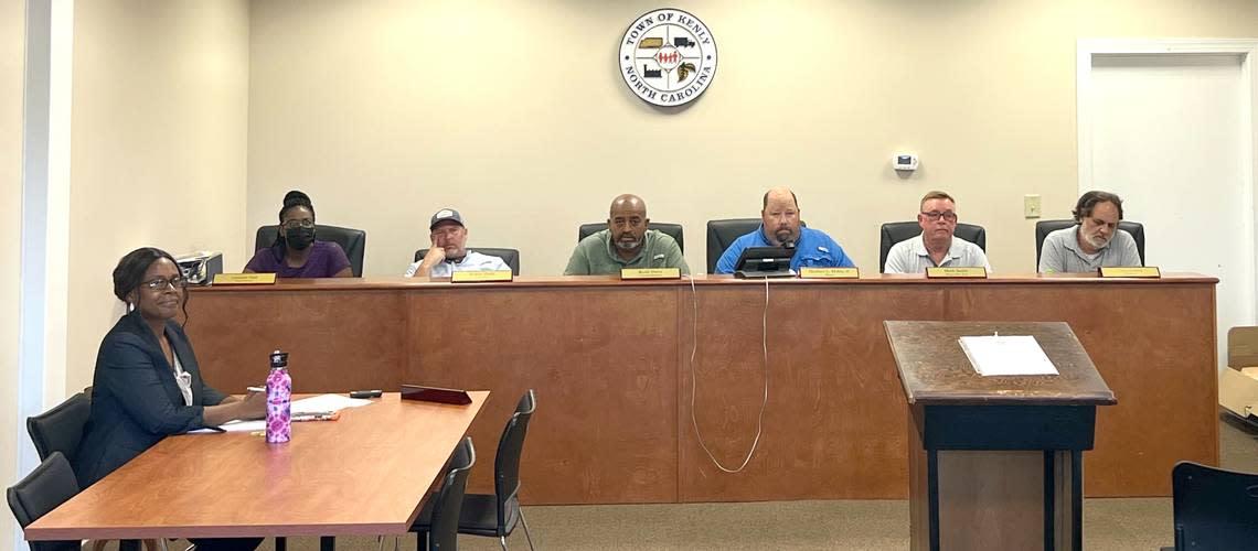 Kenly town manager Justine Jones, left, and the Town Council prepare to start an emergency session in Kenly, N.C. Friday, July 22, 2022. The session is in response to the abrupt resignation of the police chief, four officers, and two administrators.