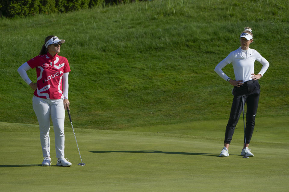 Hannah Green, of Australia, left, and Nelly Korda watch game play on the 13th hole during the final round of the Mizuho Americas Open golf tournament, Sunday, May 19, 2024, in Jersey City, N.J. (AP Photo/Seth Wenig)