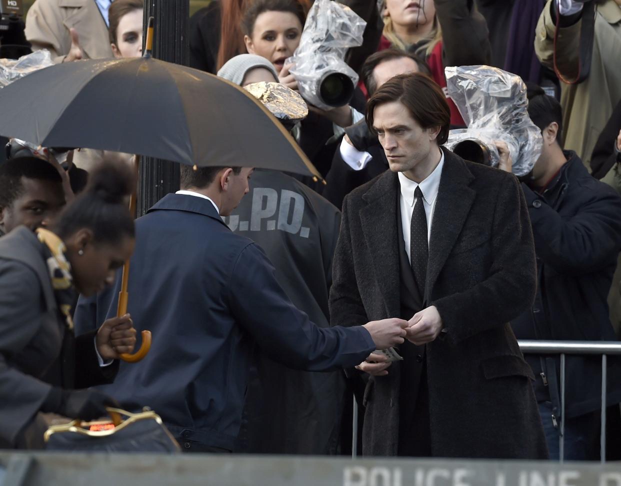 Filming is back in session after a hiatus due to COVID-19. Robert Pattinson is spotted in character as Bruce Wayne on the set of "The Batman" in Liverpool, England, on Tuesday, Oct. 13, 2020.