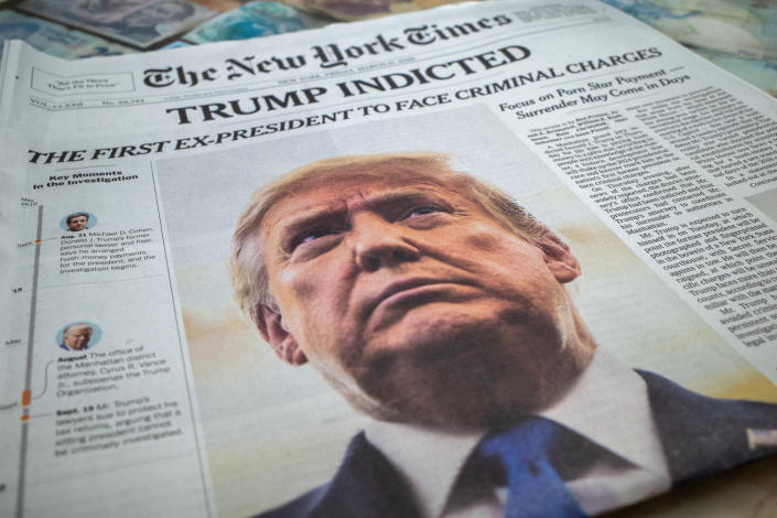 A New York Times is displayed at a newsstand following former President Donald Trump&#39;s indictment by a Manhattan grand jury on March 30. 