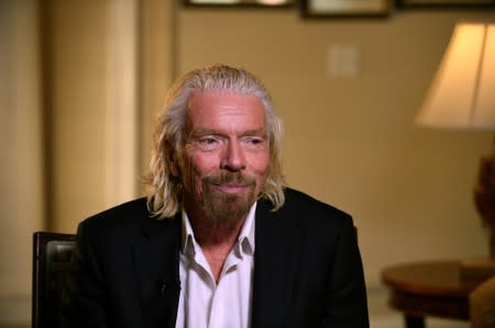 Virgin Galactic founder Richard Branson speaks during the Space Symposium in Colorado Springs