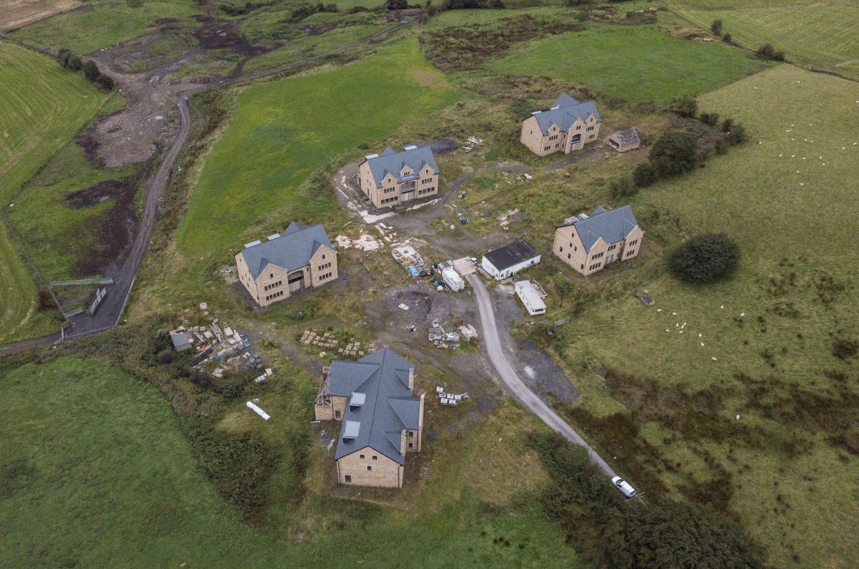 Drone images of mansions under threat of demolition, Bolton, Lancs. See SWNS story SWLEhouses; The owners of five luxury mansions which were built too big and in the wrong place face the threat of having their million-pound homes demolished. Residents wanted to broker a deal with a local council after it was found the properties were not built in accordance with planning permission. It had been hoped council chiefs would wave through the latest application after it was recommended for approval by town planners. But the revised plans, which involved knocking down and rebuilding two properties and reducing the size of another at a cost of more than Â£1m, was last week thrown out by councillors.