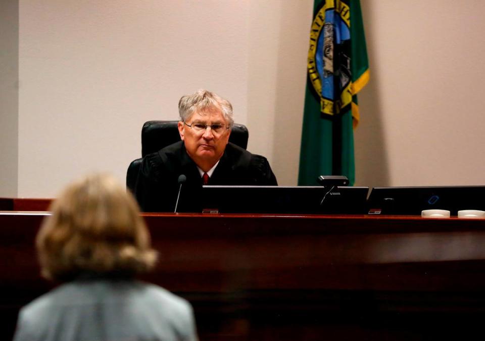 Yakima County District Court Judge Donald Engel listens to arguments about evidence from Laura Twitchell, assistant state Attorney General.