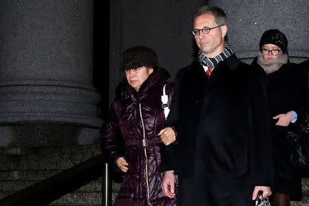 Art dealer Glafira Rosales leaves the Manhattan Federal Courthouse with her attorney Bryan Skarlatos in New York City, U.S., January 31, 2017. REUTERS/Brendan McDermid
