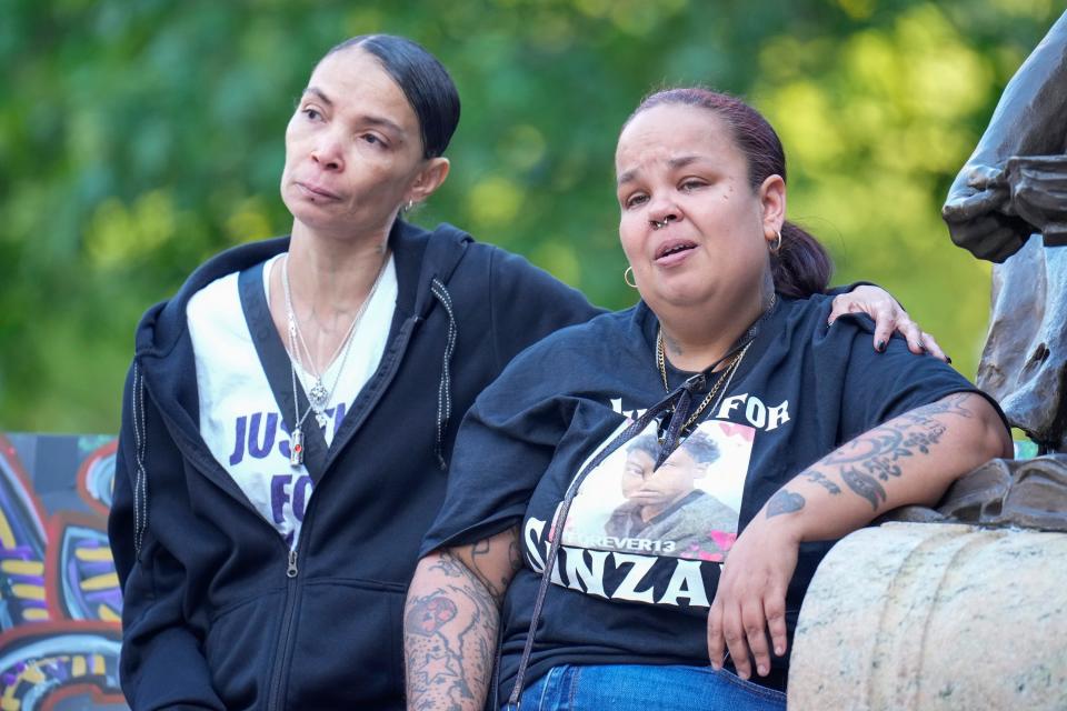 May 20, 2023; Columbus, Ohio, US;  Sinzae Reed’s mother Megan Reed, right, watches speakers during a protest for her son who was shot and killed in Columbus’ Hilltop neighborhood on Oct. 12, 2022 by Krieg Butler. A Franklin County grand jury recently declined to file murder charges for Butler. 