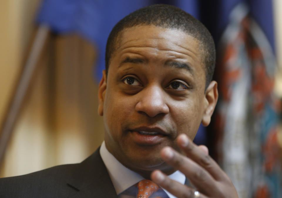 FILE - In this Feb. 22, 2019, file photo, Virginia Lt. Gov. Justin Fairfax presides over the Senate session at the Capitol in Richmond, Va. A series of scandals surrounding Virginia's top Democrats has made it difficult for them to raise money in a key election year. Fairfax, Gov. Ralph Northam and Attorney General Mark Herring all posted anemic campaign finance reports Monday, April 15, that are far below what their predecessors have raised at similar points in past election cycles. (AP Photo/Steve Helber, File)