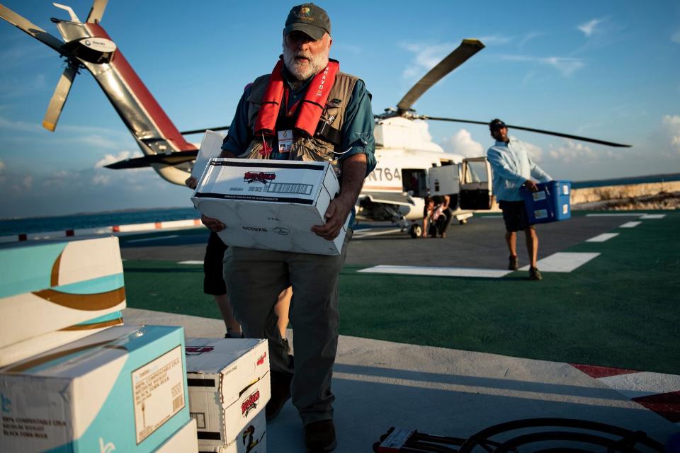 Chef Jose Andres carries food relief while working with his charity group World Central Kitchen