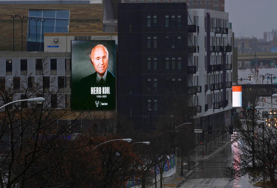 An image of Herb Kohl is seen on the Fiserv Forum parking structure near the stadium at West McKinley Avenue and North Sixth Street in Milwaukee on Thursday, Dec. 28, 2023. Kohl, the former U.S. senator, Milwaukee Bucks owner and retail shopping magnate, died Wednesday afternoon at the age of 88 after a brief illness.