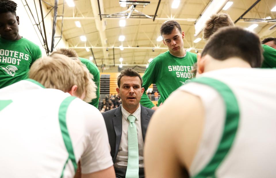 West Salem head coach Travis Myers instructs players before the first half against Oregon City at West Salem High School in Salem, Ore. on Wednesday, March 1, 2023.
