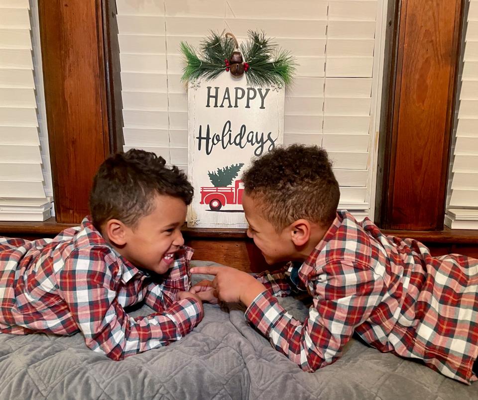 Tariq Massenburg's 4-year-old twins Kyzer, left, and Kashton.