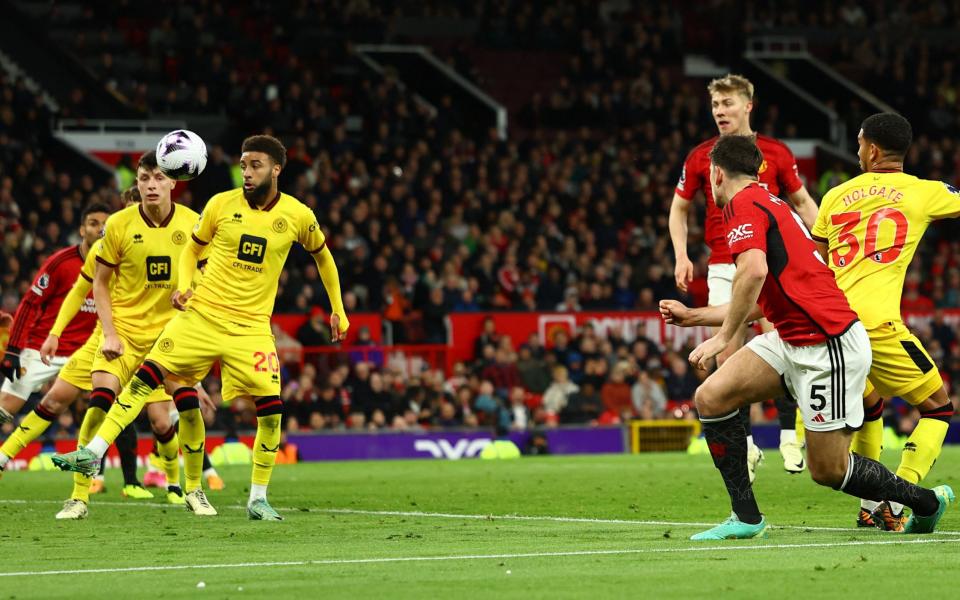 Soccer Football - Premier League - Manchester United v Sheffield United - Old Trafford, Manchester, Britain - April 24, 2024 Manchester United's Harry Maguire scores their first goal