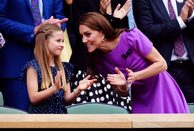 The Princess of Wales and Princess Charlotte watch from the Royal Box