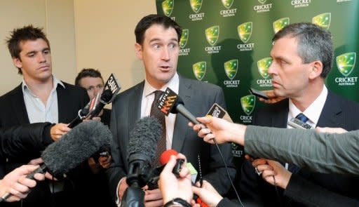 File photo shows Cricket Australia chief James Sutherland (C) talking to the media in Melbourne in December 2010. Sutherland on Tuesday said allegations made in a London court implicating Australian players in match-fixing were baseless claims made by a person of "dubious repute"