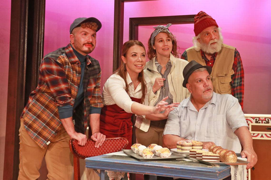 From left, Conor Walton, Melissa Ann Hubicsak, Elizabeth Price, Michael Gioia and JL Rey (seated) take in the symbolism of a red bird in “Sweet Goats and Blueberry Señoritas”at Actors’ Playhouse at the Miracle Theatre. 