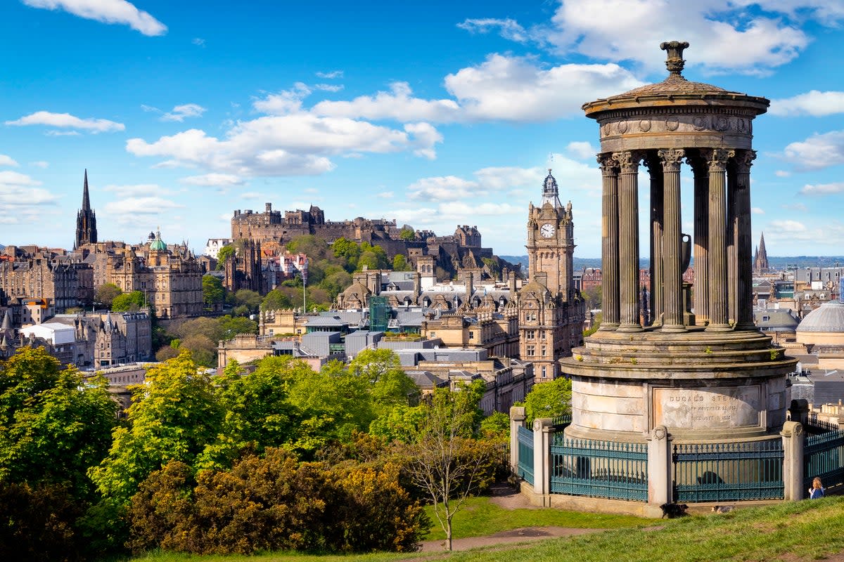 The Dugald Stewart monument and the view over Edinburgh from Calton Hill (Getty/iStock)