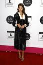 <p>Gerber wore a beautiful Celine by Hedi Slimane monochrome dress in Los Angeles for the LA Art Show Opening Night premiere party on January 19, 2022. She styled the look with Hollywood-inspired curls and black strappy heels. </p>