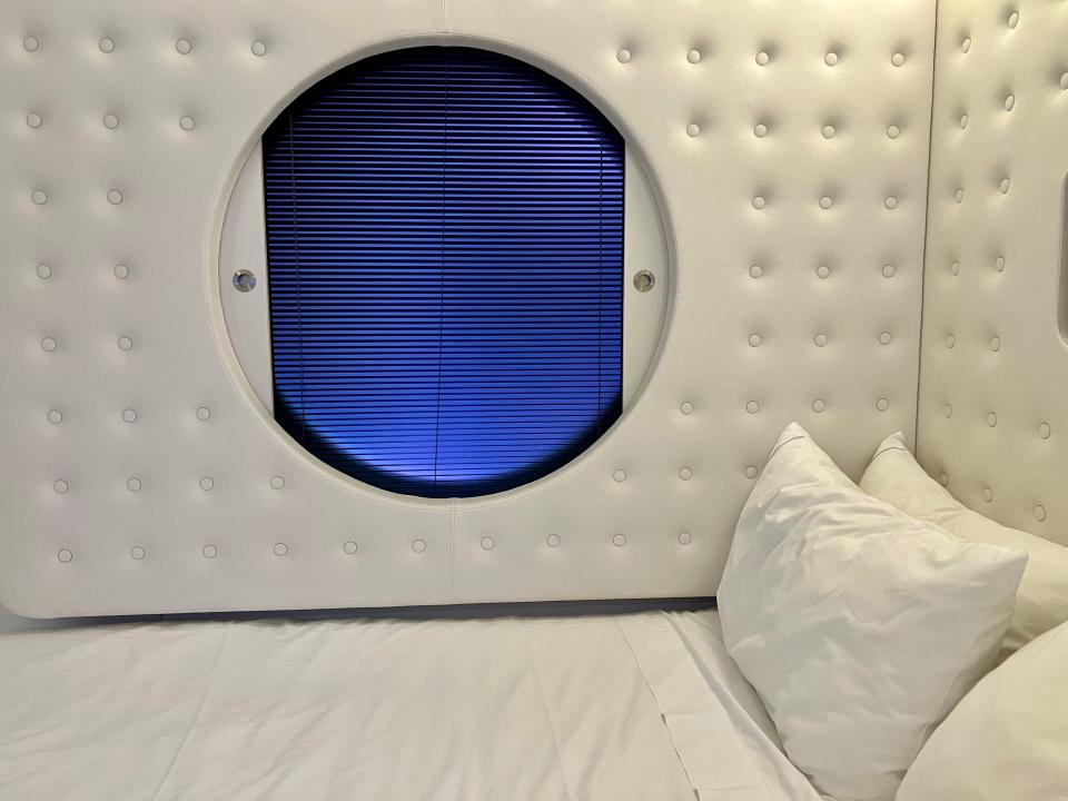 Norwegian Getaway circular window over bed