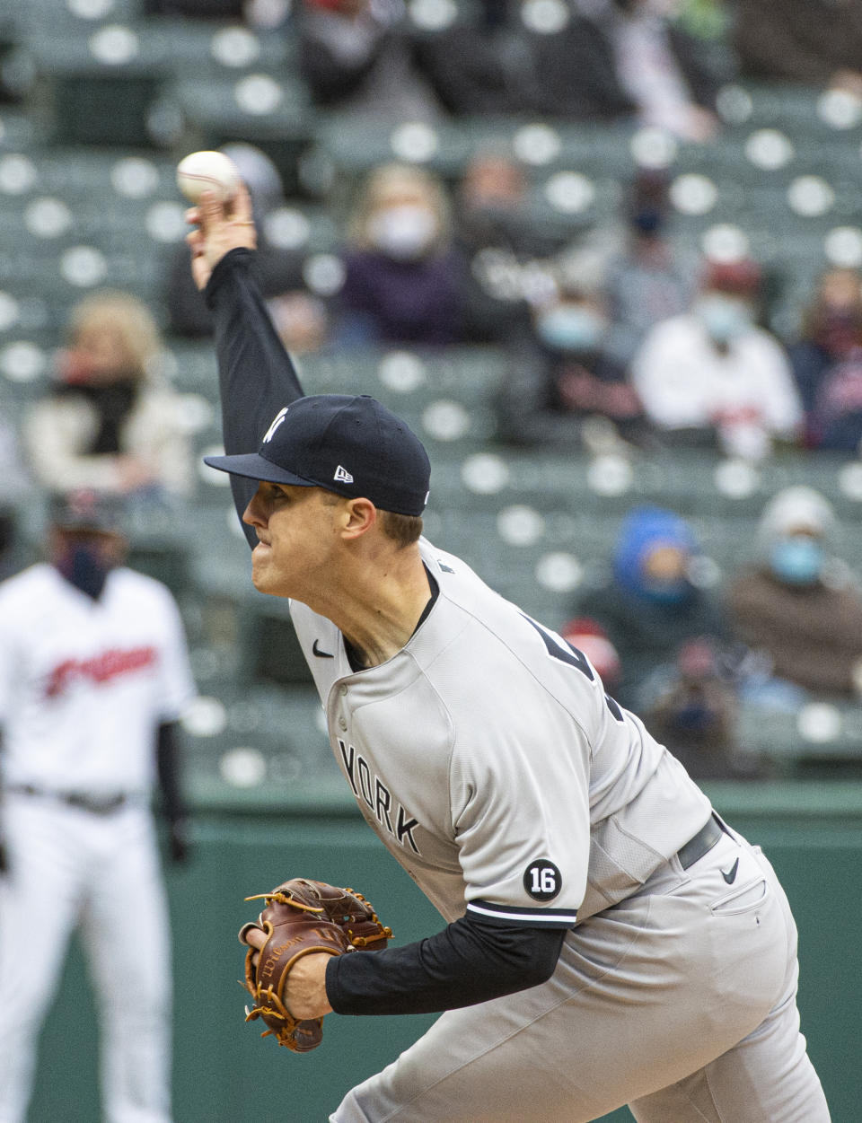 New York Yankees starting pitcher Jameson Taillon delivers against the Cleveland Indians during the first second inning of a baseball game in Cleveland, Sunday, April 25, 2021. (AP Photo/Phil Long)