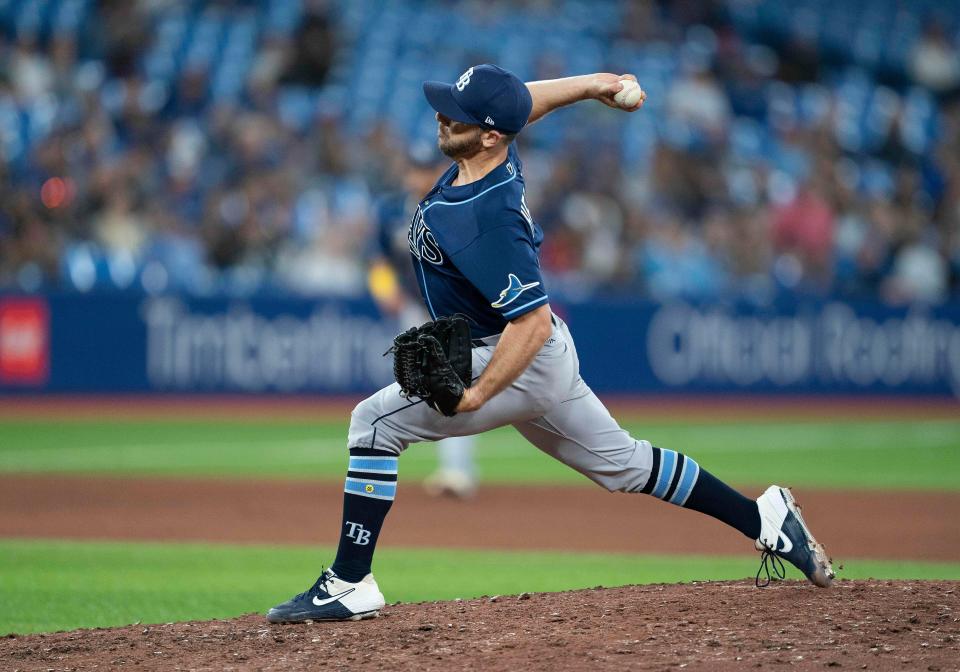 Rays reliever Kevin Herget throws a pitch against the Blue Jays in a game on Sept. 13.