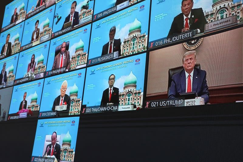 U.S. President Donald Trump is seen on a screen attending the virtual APEC Economic Leaders Meeting 2020, in Kuala Lumpur