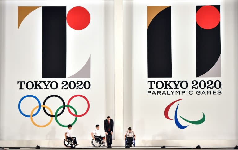 Japan's cabinet has approved setting a 155 bn yen ($1.28 bn) cap on construction costs for the main stadium for the 2020 Tokyo Olympics