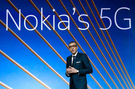 FILE PHOTO: Rajeev Suri, Nokia's President and Chief Executive Officer, speaks during the Mobile World Congress in Barcelona, Spain February 25, 2018. REUTERS/Yves Herman/File Photo