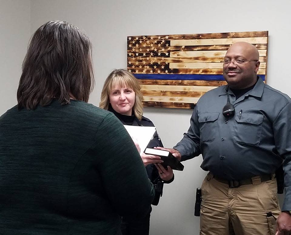 Assistant Chief Somer Oberlin of the Weaverville Police Department swearing in Officer Reggie Ray during her brief time as interim chief in 2019.