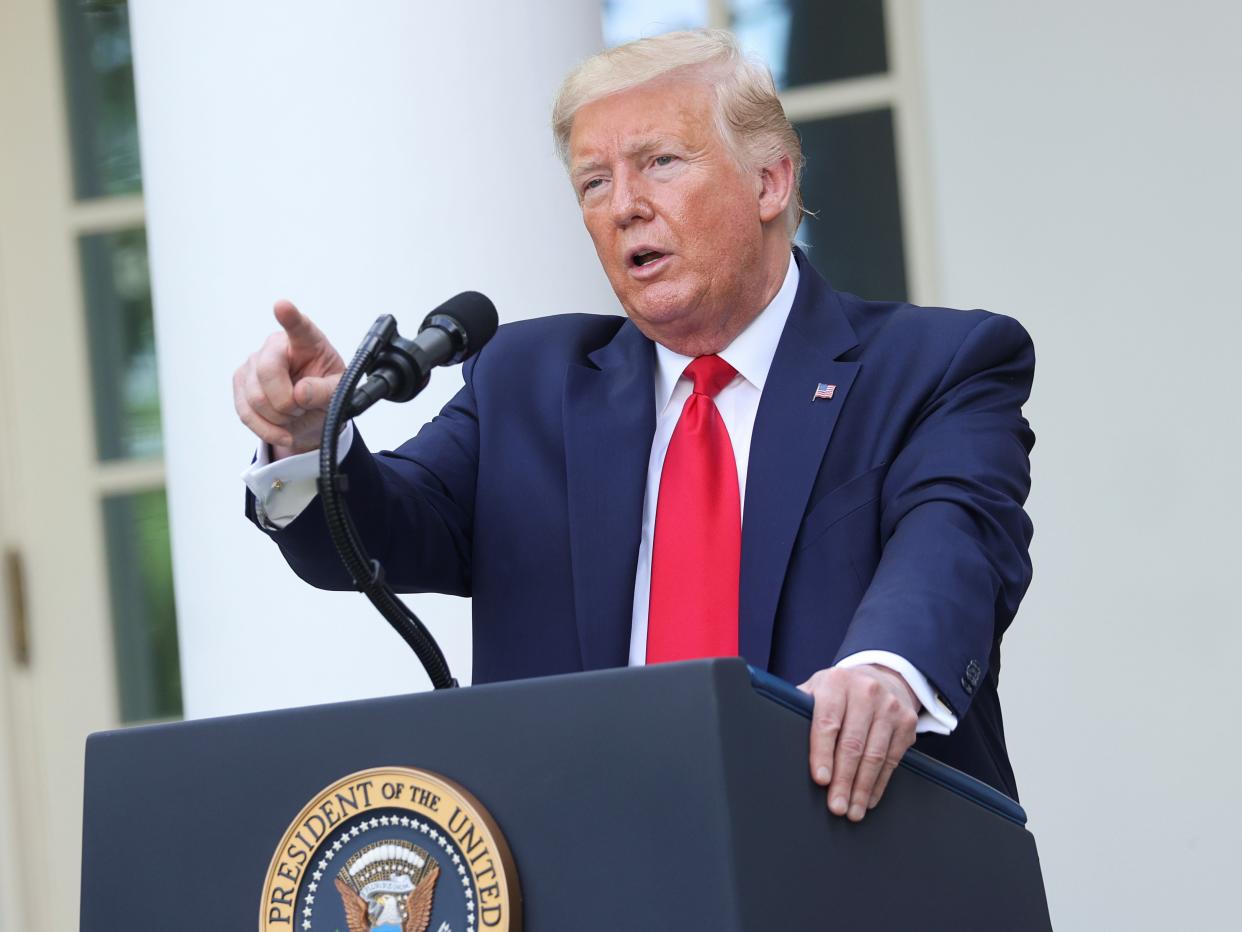 FILE PHOTO: U.S. President Donald Trump takes questions after speaking about the coronavirus disease (COVID-19) outbreak and the cost of treating diabetes and  in the Rose Garden at the White House in Washington, U.S., May 26, 2020. REUTERS/Jonathan Ernst