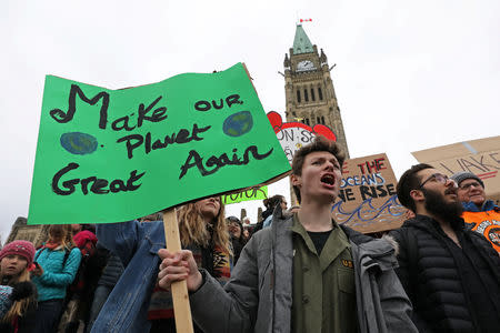 Students hold a protest against climate change on Parliament Hill in Ottawa, Ontario, Canada, March 15, 2019. REUTERS/Chris Wattie