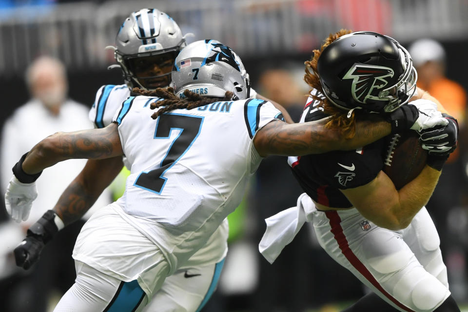 Carolina Panthers outside linebacker Shaq Thompson (7) hits Atlanta Falcons tight end Hayden Hurst (81) during the first half of an NFL football game, Sunday, Oct. 31, 2021, in Atlanta. (AP Photo/John Amis)