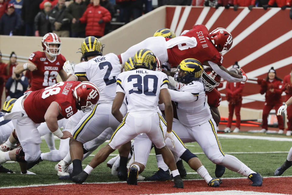 Indiana running back Stevie Scott III (8) goes in for a touchdown during the first half of an NCAA college football game against Michigan, Saturday, Nov. 23, 2019, in Bloomington, Ind. (AP Photo/Darron Cummings)