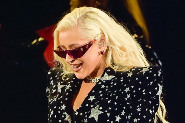 Christina Aguilera Rocks the Stage in Leather Boots and Starry Blazer at  AHF World AIDS Day Concert