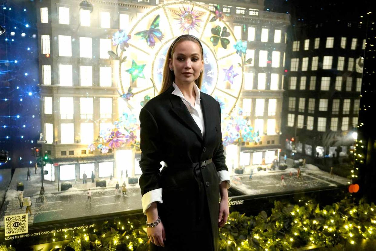 <p>Timothy A. Clary/AFP via Getty Images</p> Jennifer Lawrence attends Dior