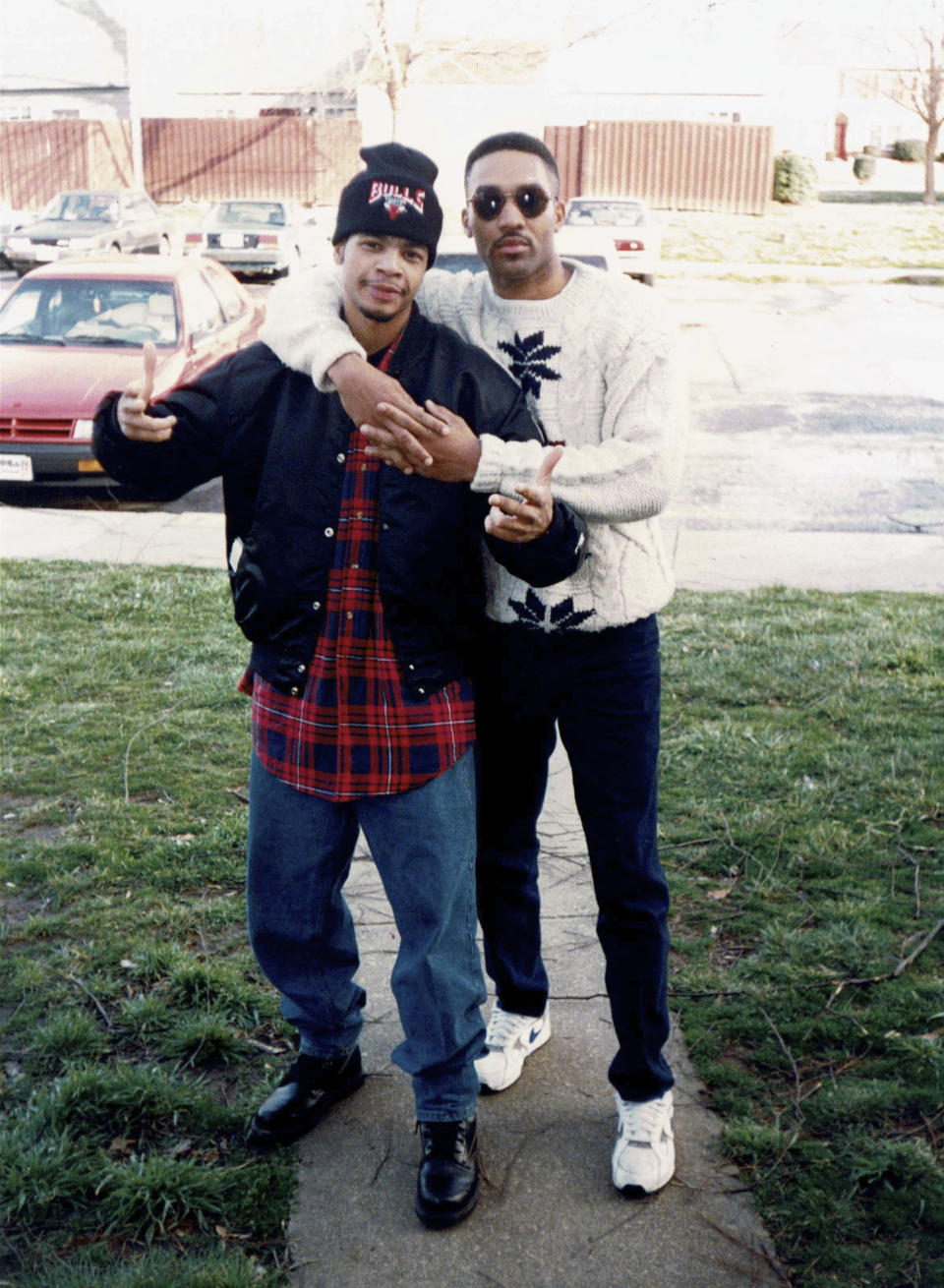 This early 1990's photo provided by musician DJ Nabs shows him, left, with his childhood friend, Alton Lucas in North Carolina. (Courtesy DJ Nabs via AP)