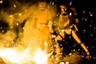 <p>This image of Flametroopers incinerating a Jakku village by Johnny Wu (<a href="http://t.umblr.com/redirect?z=https%3A%2F%2Fwww.instagram.com%2Fsgtbananas%2F&t=NGQxMThjYWM3ZDk0MjRkNDk0NDExN2Q3MTU0ZjBlMmUyNDY1NjBlMSxkU1h4MXd4WA%3D%3D" rel="nofollow noopener" target="_blank" data-ylk="slk:@sgtbananas;elm:context_link;itc:0;sec:content-canvas" class="link ">@sgtbananas</a>) is not part of the Comic-Con exhibit. </p>