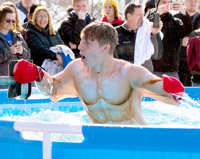 A participant in the Polar Plunge hits the water to benefit Special Olympics Indiana.