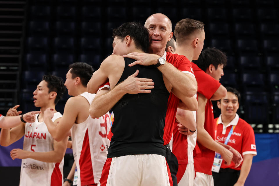 OKINAWA, JAPAN - SEPTEMBER 02: Head Coach Tom Hovasse 
 of Japan and Yudai Baba #18 celebrate the victory after  the FIBA Basketball World Cup Classification 17-32 Group O game between Japan and Cape Verde at Okinawa Arena on September 02, 2023 in Okinawa, Japan. (Photo by Takashi Aoyama/Getty Images)