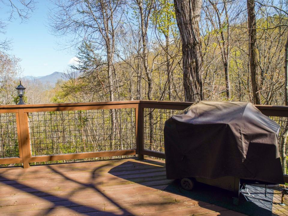 Porch,  Joey Hadden, "I spent 2 nights in a cozy A-frame cabin for the first time while visiting the Great Smoky Mountains"