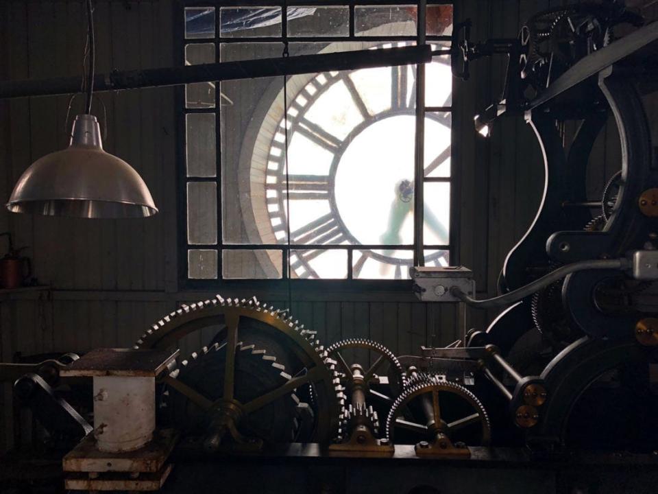 The inner workings of the Marshall County Courthouse clock tower under repair after a 2018 tornado.
