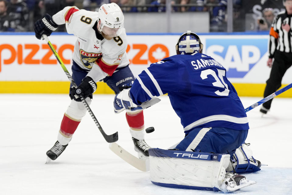 Florida Panthers center Sam Bennett (9) tries to get the puck past Toronto Maple Leafs goaltender Ilya Samsonov (35) during the first period of Game 1 of an NHL hockey Stanley Cup second-round playoff series in Toronto, Tuesday, May 2, 2023. (Frank Gunn/The Canadian Press via AP)