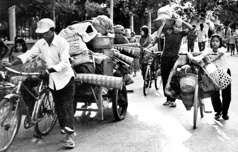 Photo taken in the days after Khmer Rouge forces seized Phnom Penh on April 17, 1975 shows Cambodians leaving in an exodus as the communist regime ordered the city's two million people to evacuate