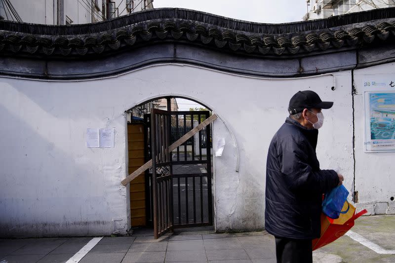 A closed entrance of a residential community is seen in Shanghai, in Qibao, an old river town on the outskirts of Shanghai