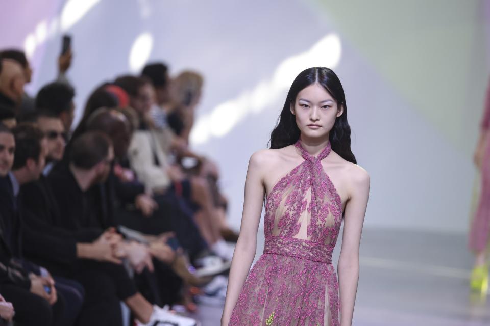 A model wears a creation for the Elie Saab ready-to-wear Spring/Summer 2023 fashion collection presented Saturday, Oct. 1, 2022 in Paris. (Photo by Vianney Le Caer/Invision/AP)