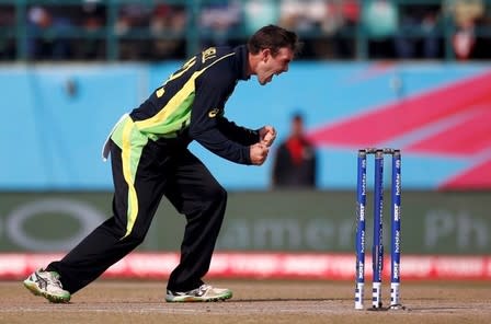 Cricket - Australia v New Zealand - World Twenty20 cricket tournament - Dharamsala, India, 18/03/2016. Australia's Glenn Maxwell celebrates taking the wicket of New Zealand's captain Kane Williamson. REUTERS/Adnan Abidi