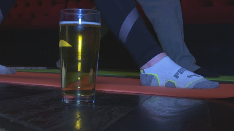 'Beer yoga' helps Windsorites stretch while they sip