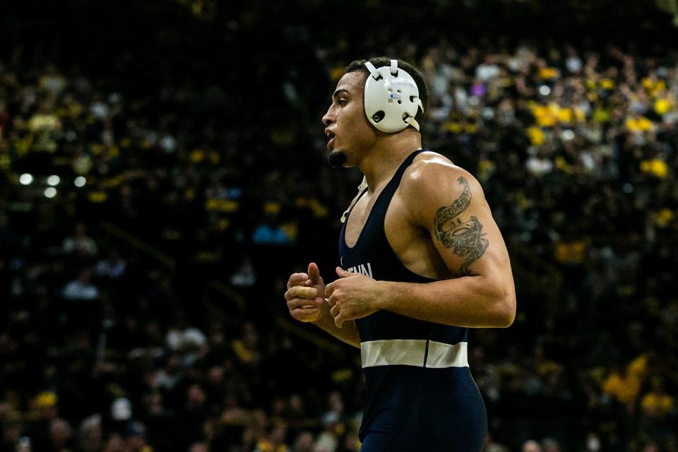 Penn State's Aaron Brooks reacts after scoring an 8-3 decision at 184 pounds Friday night against Iowa's Abe Assad at Carver-Hawkeye Arena.